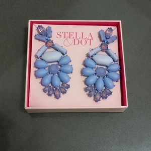 A purple/violet/blue hued chandelier earrings